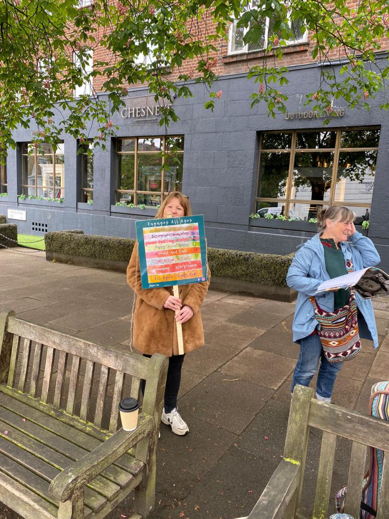 Woman holding placard